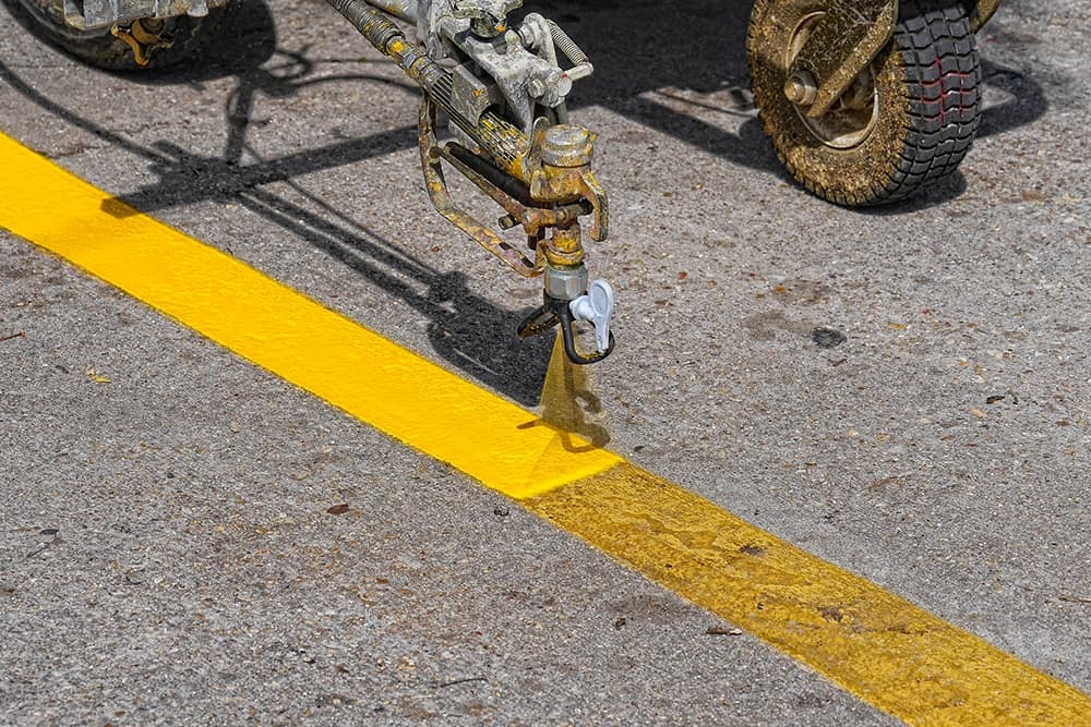 Freshly painted white parking stall lines